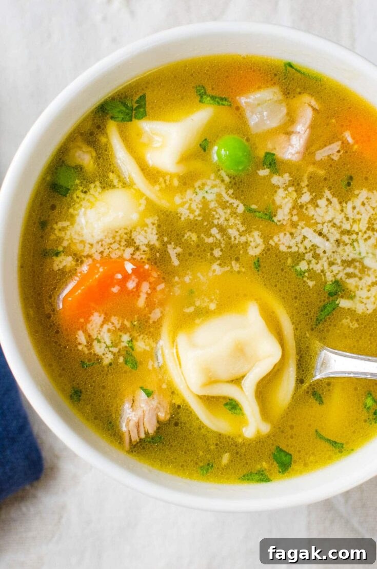 Turkey tortellini soup in a bowl.