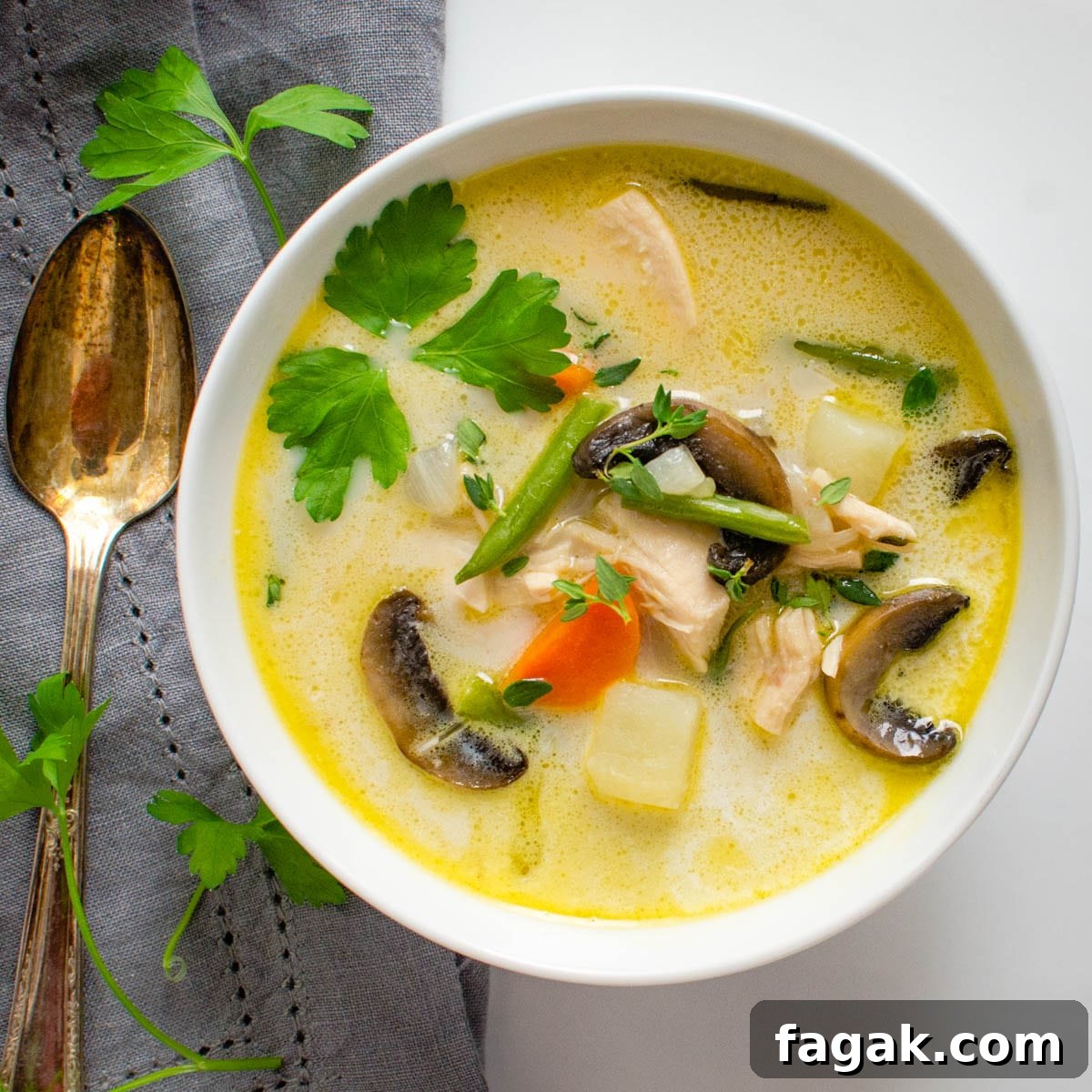 creamy turkey vegetable soup in a bowl.