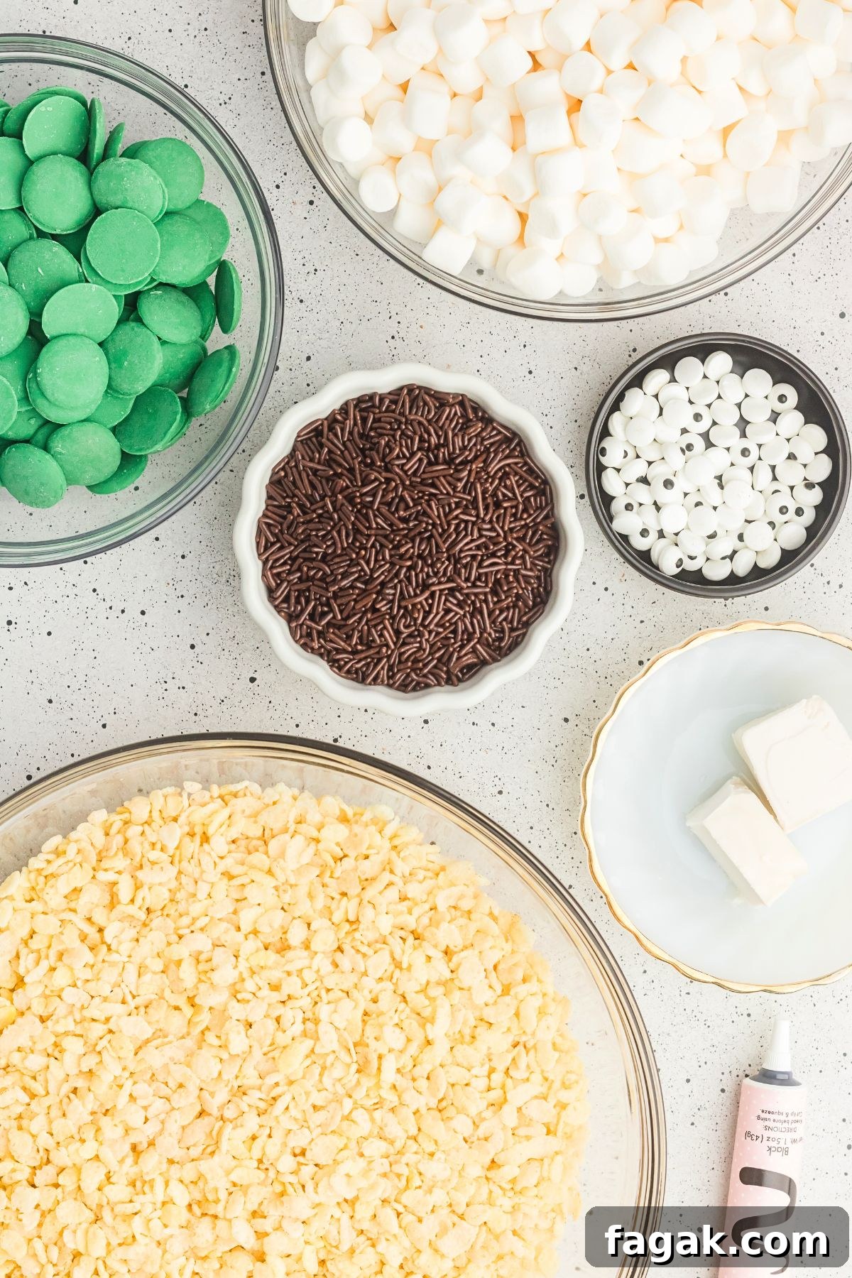 Rice cereal with other ingredients needed to make rice krispies treats.