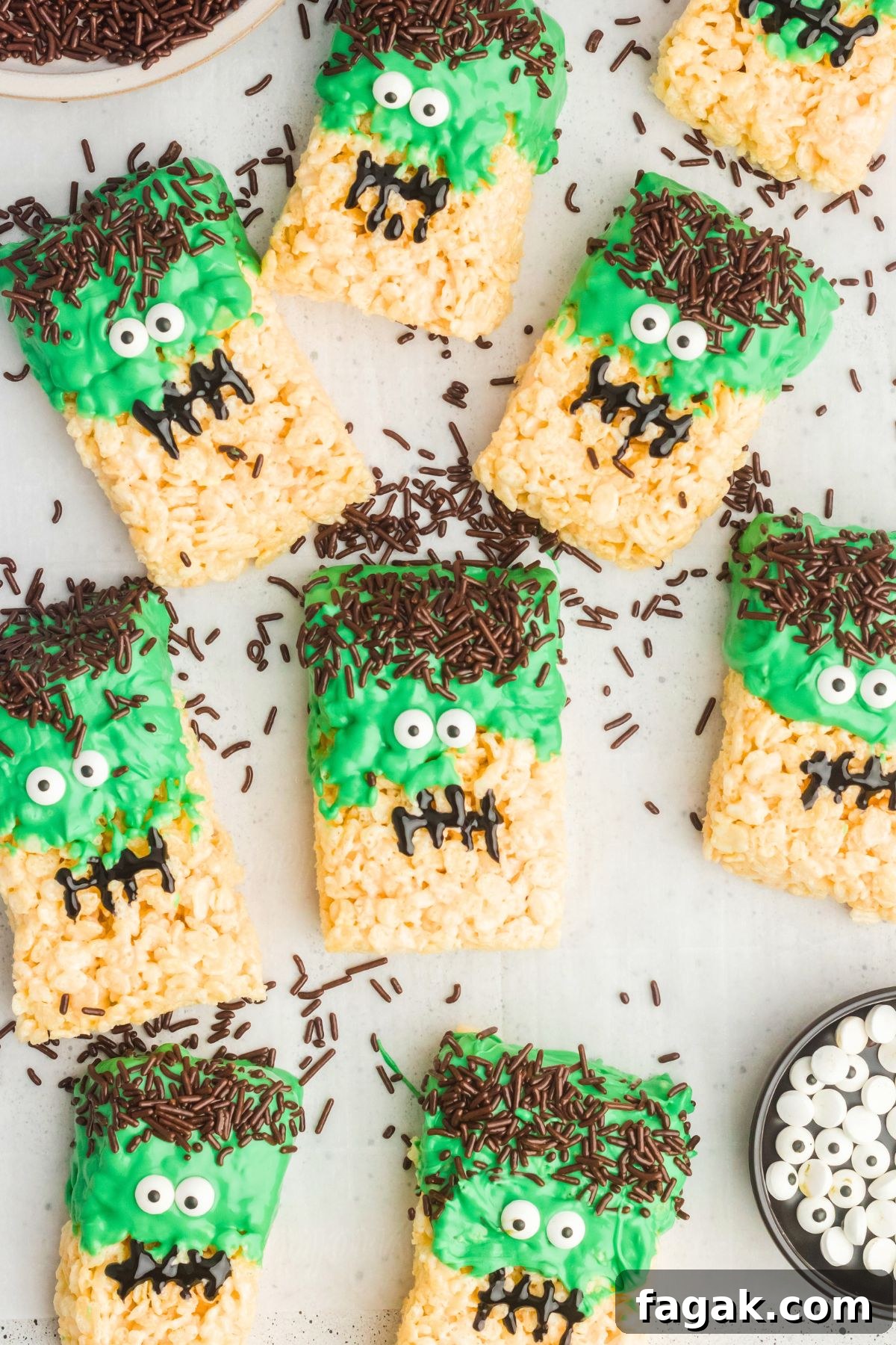 Bright green Halloween rice krispie treats in the shape of Frankenstein.