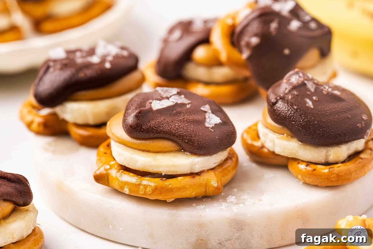 Side view of chocolate pretzel banana bites.