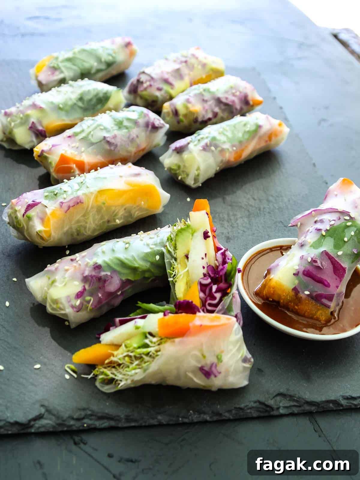Crispy Vegetable Spring Rolls Recipe with Dipping Sauce 6 Spring rolls with a roll dipped in ginger dipping sauce