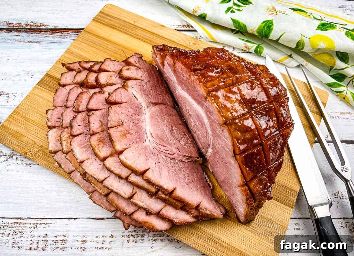 Smoked sliced ham on a cutting board.