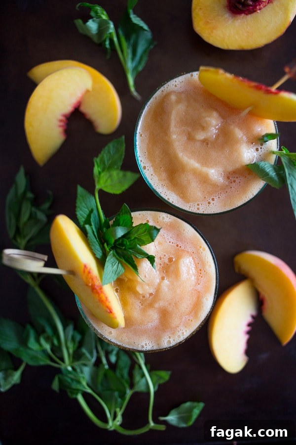 Peach Bourbon Tea Slushies Recipe for Summer Cocktails 2 These peach tea bourbon slushies are the perfect summer addition. Full of peach tea, bourbon and lots of fresh peaches. This cocktail is summer perfection!