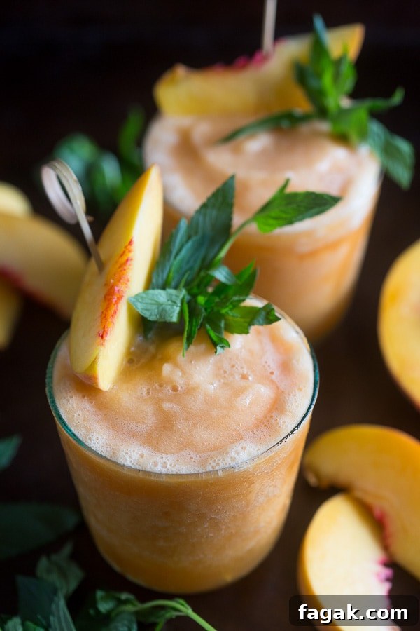 Peach Bourbon Tea Slushies Recipe for Summer Cocktails 4 These peach tea bourbon slushies are the perfect summer addition. Full of peach tea, bourbon and lots of fresh peaches. This cocktail is summer perfection!