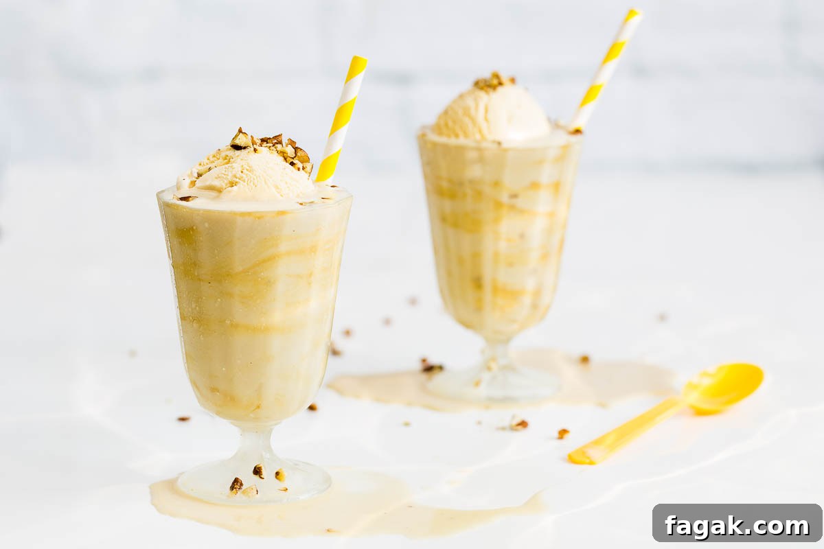 Ice cold and ready for summer, this dairy free banana milkshake with peanut butter is also vegan, perfect for a hot day and anyone's diet, it's a summer drink that will keep you cool and your tastebuds tantalised. Made with any non-dairy milk, frozen banana, a smattering of peanut butter and topped with crushed pecans, it's even more delicious than it looks.