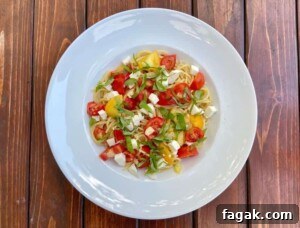 Fresh Tomato, Basil & Mozzarella Pasta Recipe for Summer 10 Tomato Basil Mozzarella Pasta (Photo by Viana Boenzli)