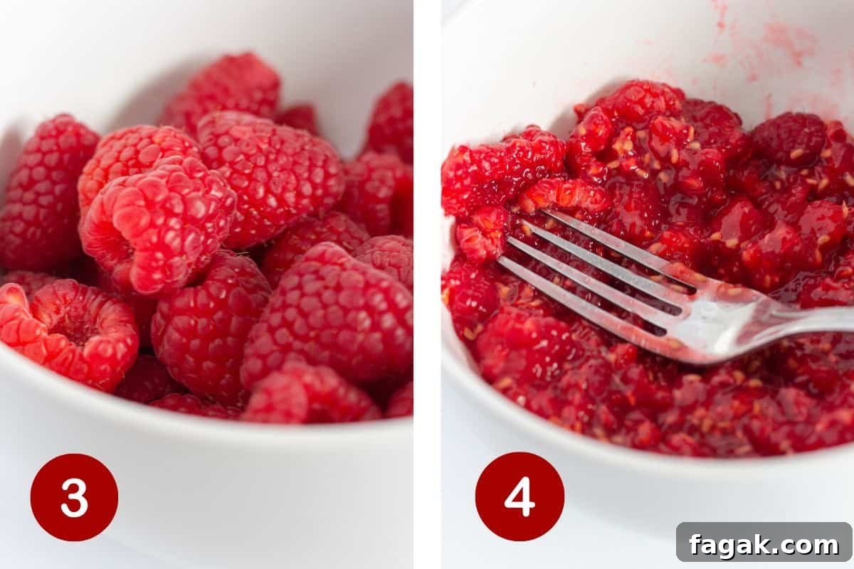 Adding raspberries to the bowl with a little sugar and mashing them to add to raspberry whipped cream.