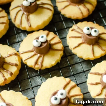 Cute Spider Halloween Biscuits on marble worktop using Rolo Chocolate and edible sweet eyes