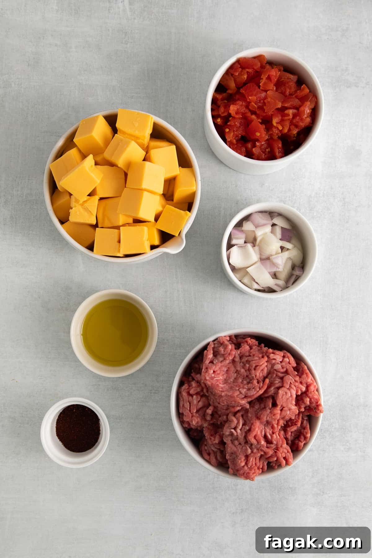 Ingredients for rotel dip in bowls.