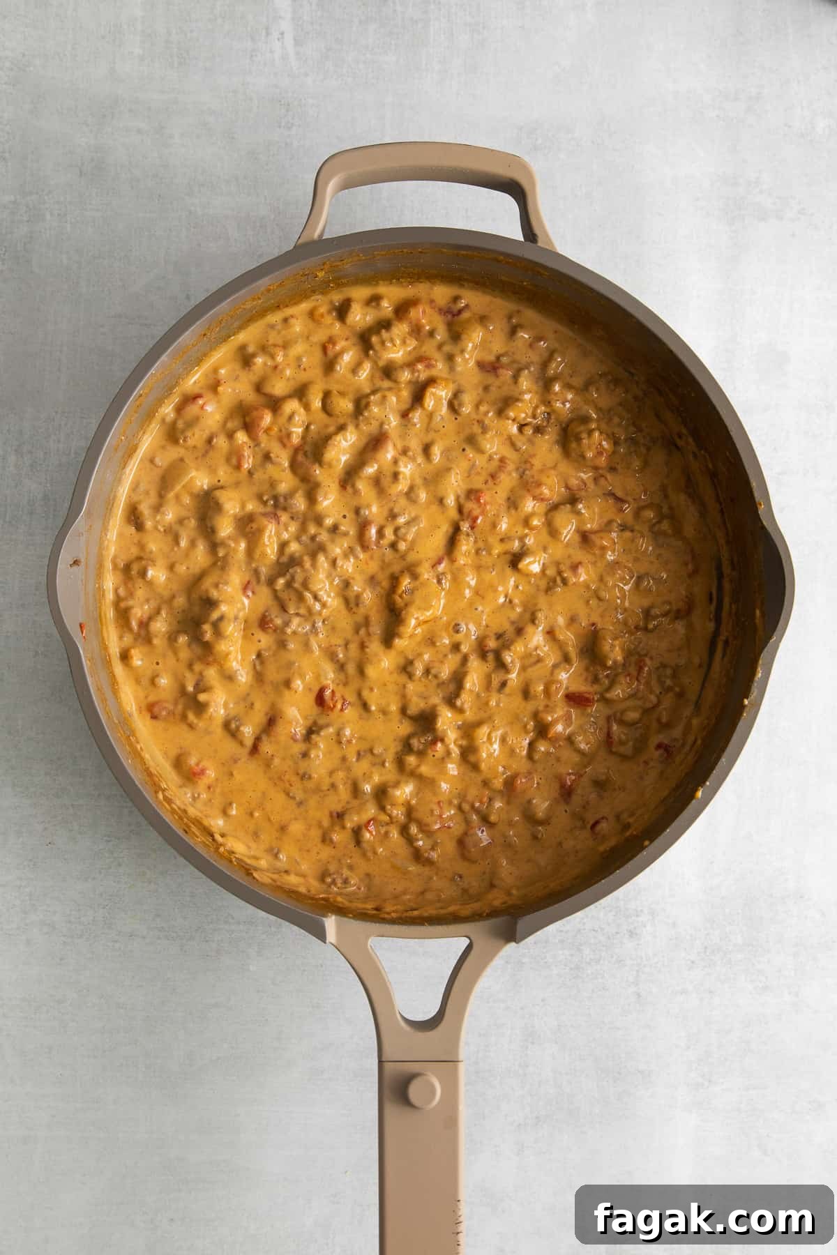 Rotel dip in a skillet.