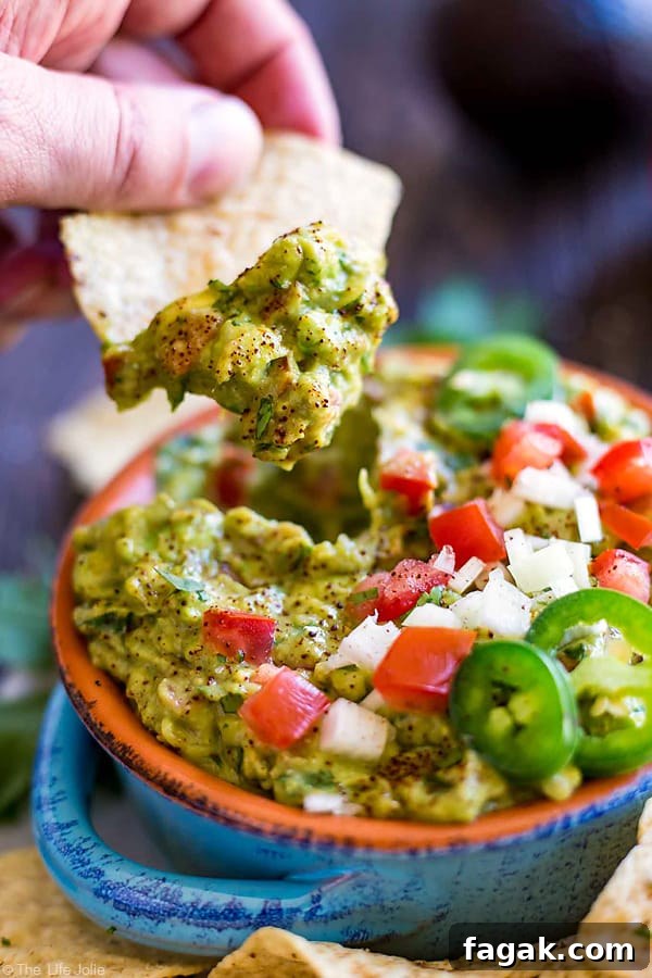 It's always a good idea to have an easy guacamole recipe up your sleeve and this one is seriously the best- fantastic, zesty flavor with an awesome secret ingredient to helps take the guacamole to the next level. It's a healthy snack for any celebration or game day!
