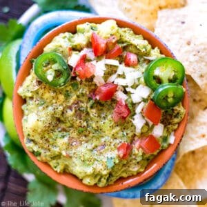 It's always a good idea to have an easy guacamole recipe up your sleeve and this one is seriously the best- fantastic, zesty flavor with an awesome secret ingredient to helps take the guacamole to the next level. It's a healthy snack for any celebration or game day!