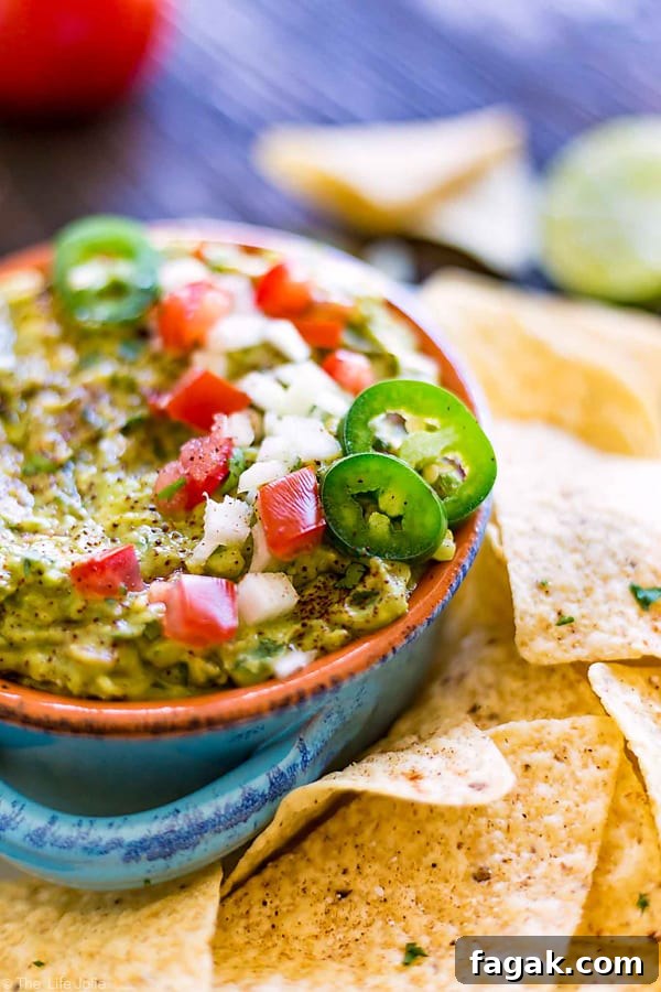 It's always a good idea to have an easy guacamole recipe up your sleeve and this one is seriously the best- fantastic, zesty flavor with an awesome secret ingredient to helps take the guacamole to the next level. It's a healthy snack for any celebration or game day!