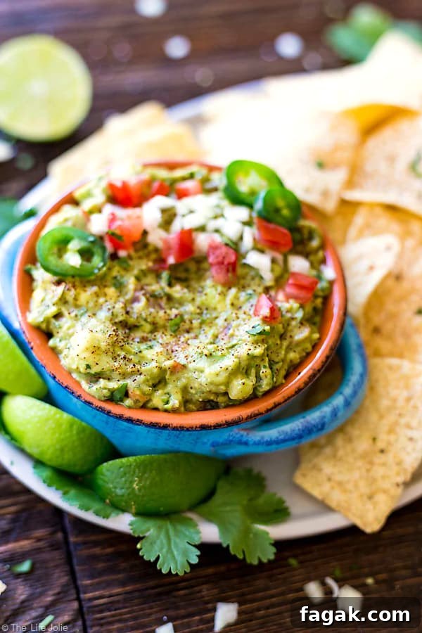 It's always a good idea to have an easy guacamole recipe up your sleeve and this one is seriously the best- fantastic, zesty flavor with an awesome secret ingredient to helps take the guacamole to the next level. It's a healthy snack for any celebration or game day!
