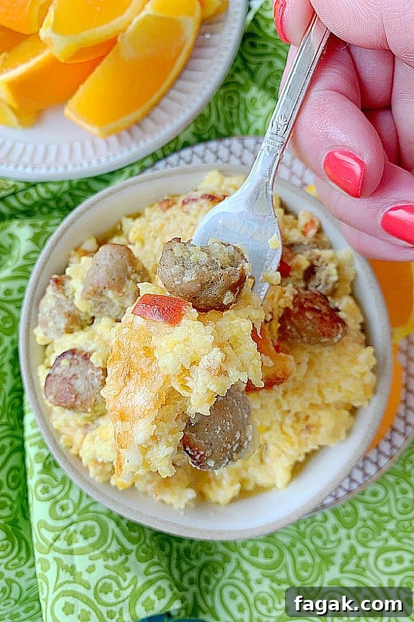 forkful of loaded grits breakfast casserole