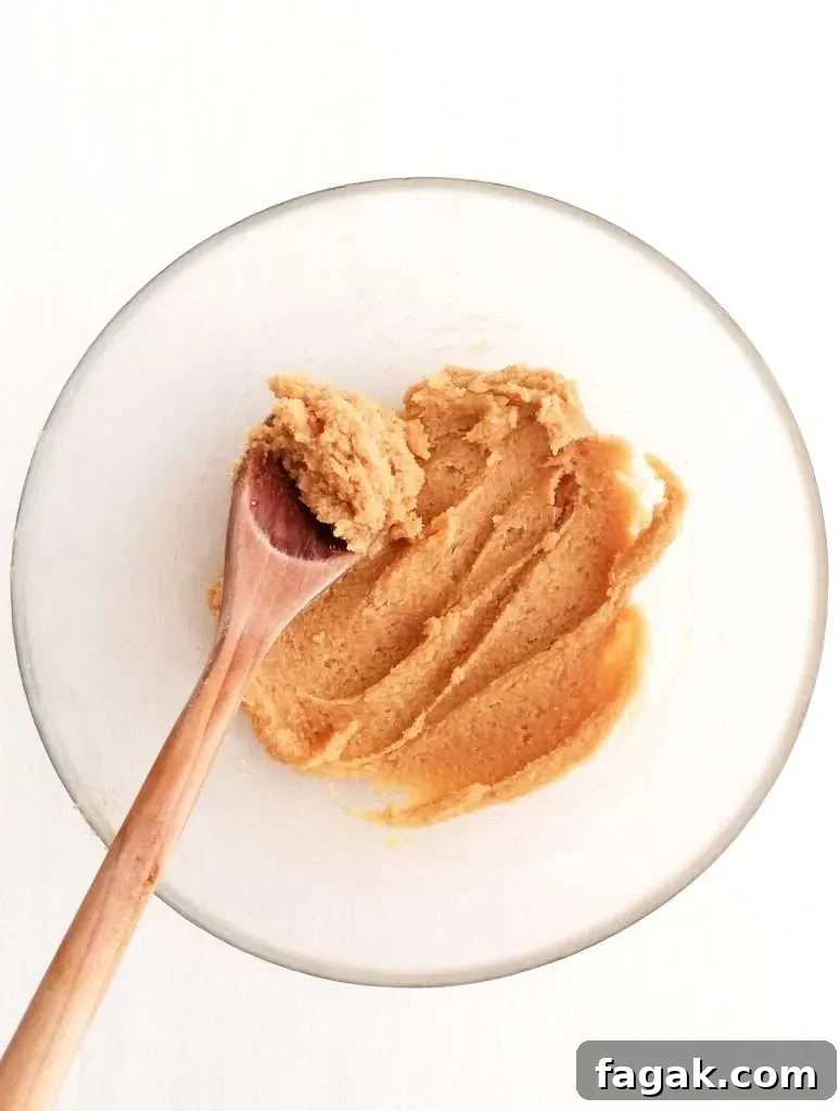 oatmeal cookies butter and sugars creamed together in bowl