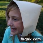 girl wearing pilgrim bonnet