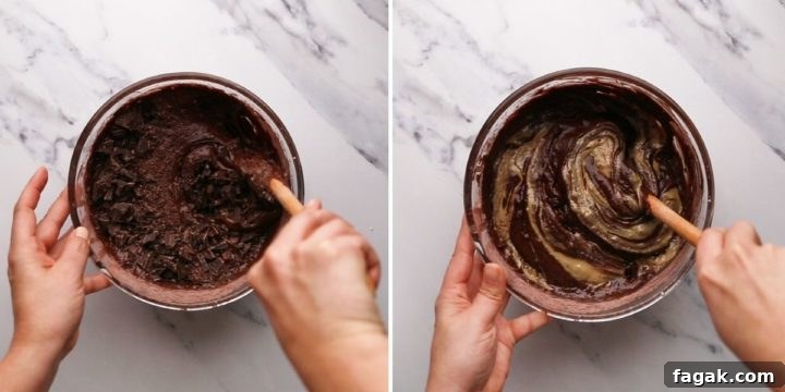 overhead view of brownie batter being mixed with chocolate and tahini