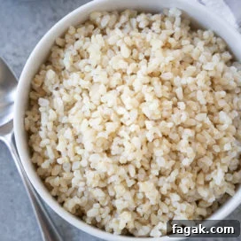 brown rice in white bowl | afoodcentriclife.com
