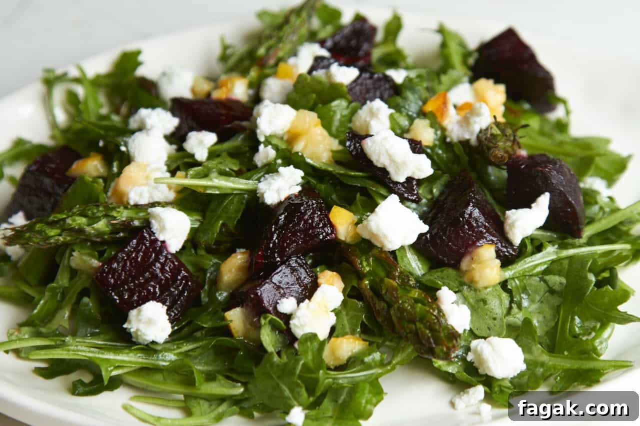Roasted vegetable salad with charred lemon vinaigrette includes grilled beets and asparagus, and goat cheese.