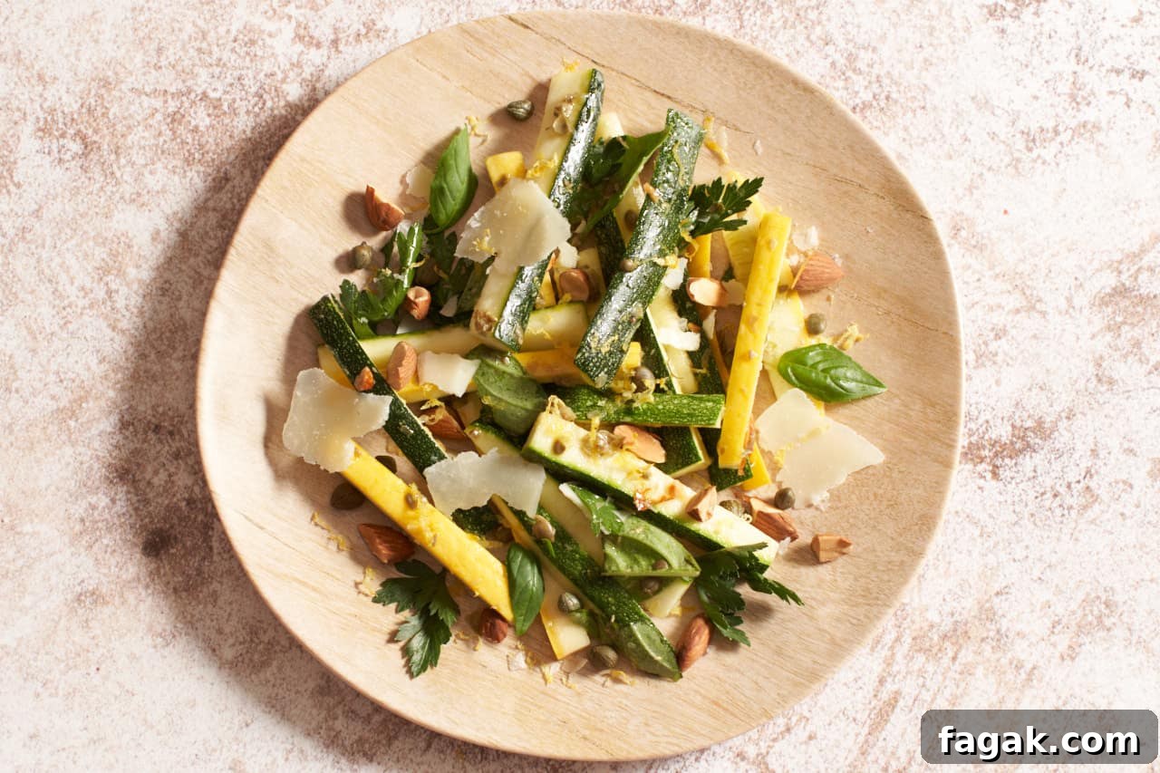 Zucchini salad on a tan plate.