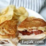 Turkey melt with side of chips.