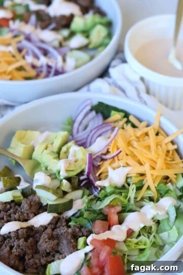 Cheeseburger bowls topped with chipotle ranch dressing.