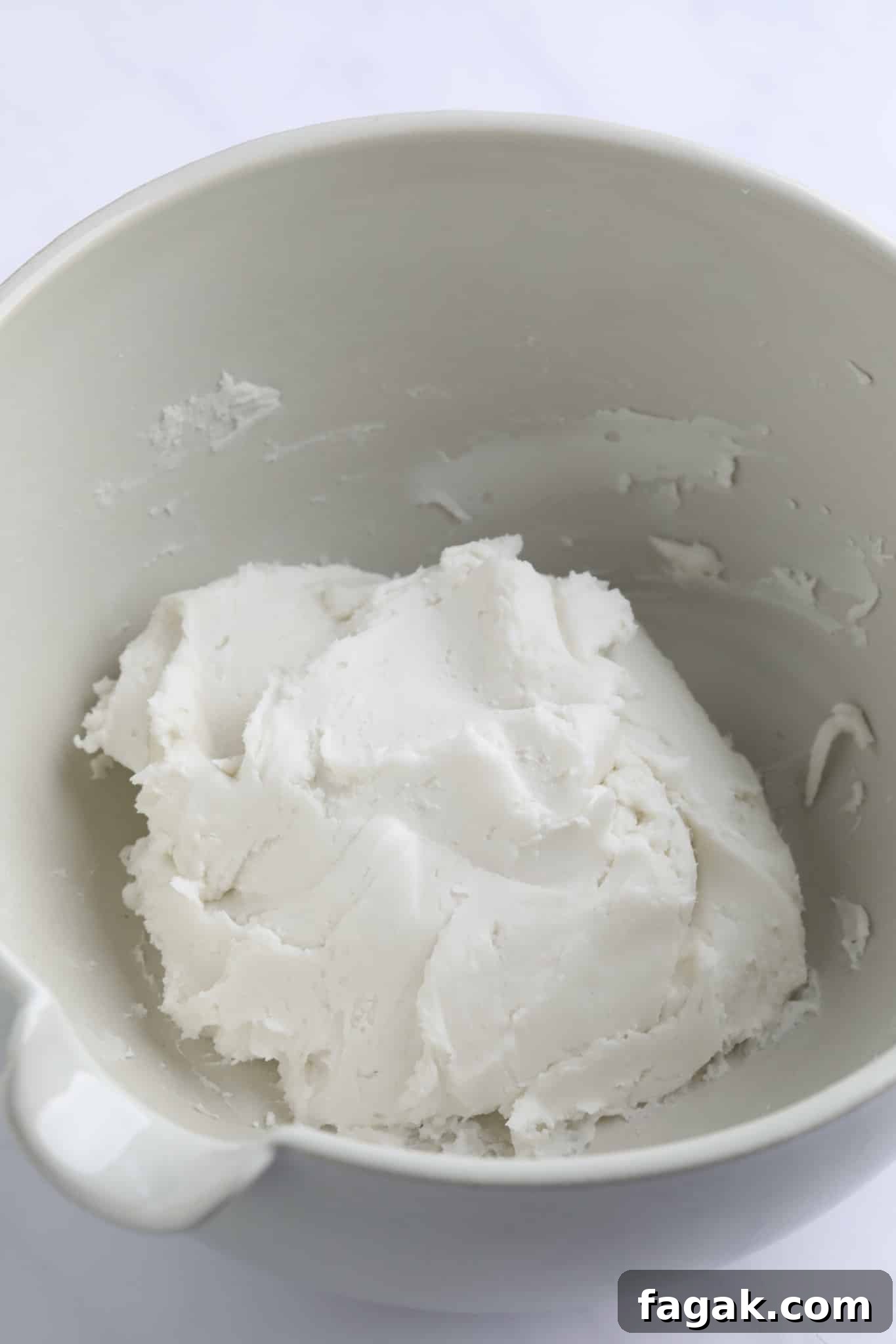 Vegan Peppermint Patties Recipe — Creamy Chocolate Mint Treats 4 a ball of white dough in a large white bowl.