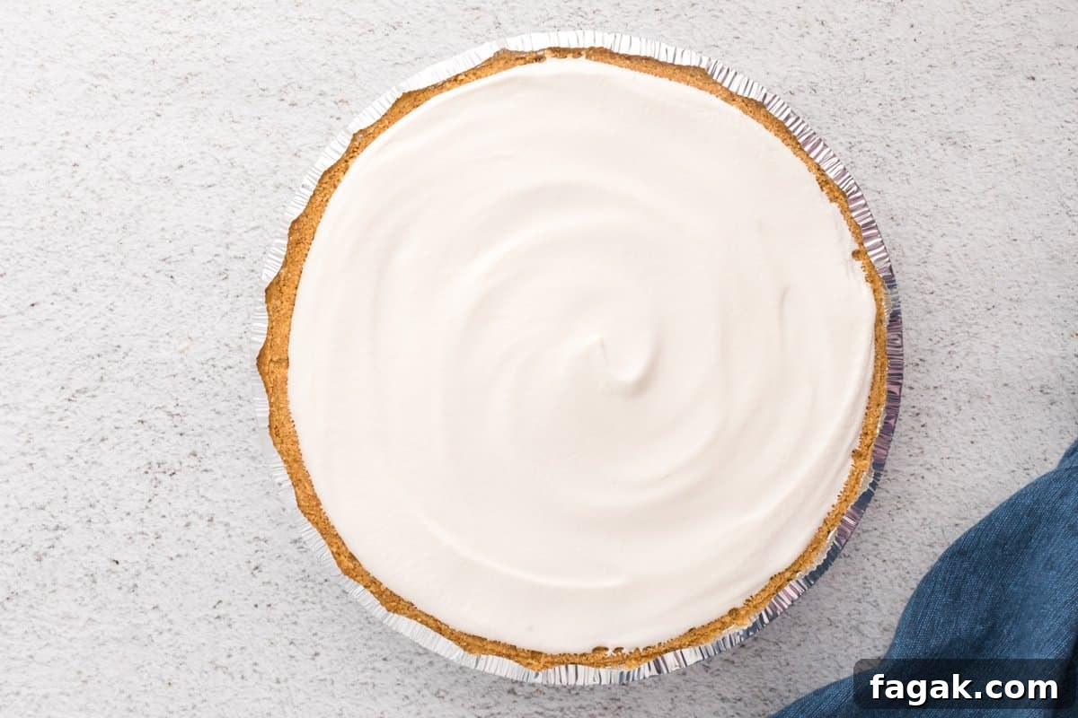 banana fudge pie topped with cool whip.