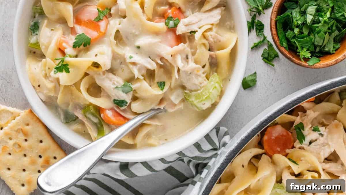 A serving of Creamy Chicken Noodle Soup With Rotisserie Chicken.