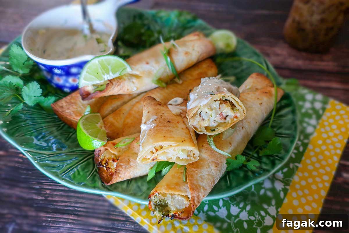 cauliflower taquitos with dip on a green plate
