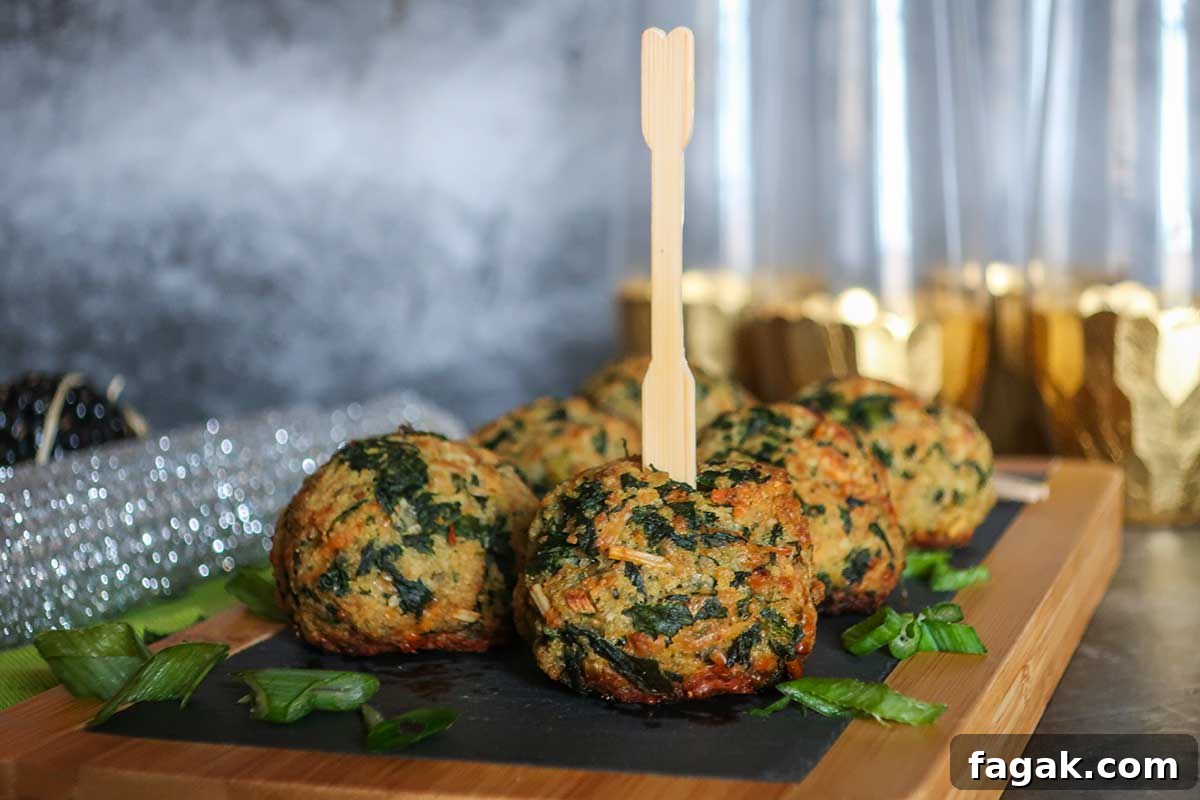 6 spinach balls on a wooden board
