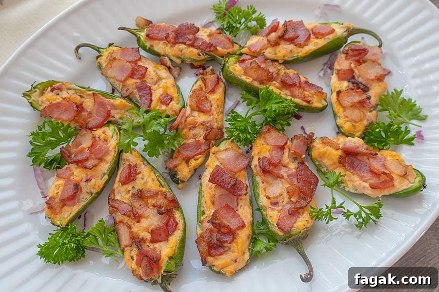 jalapano and bacon with cheese poppers on a platter for game day