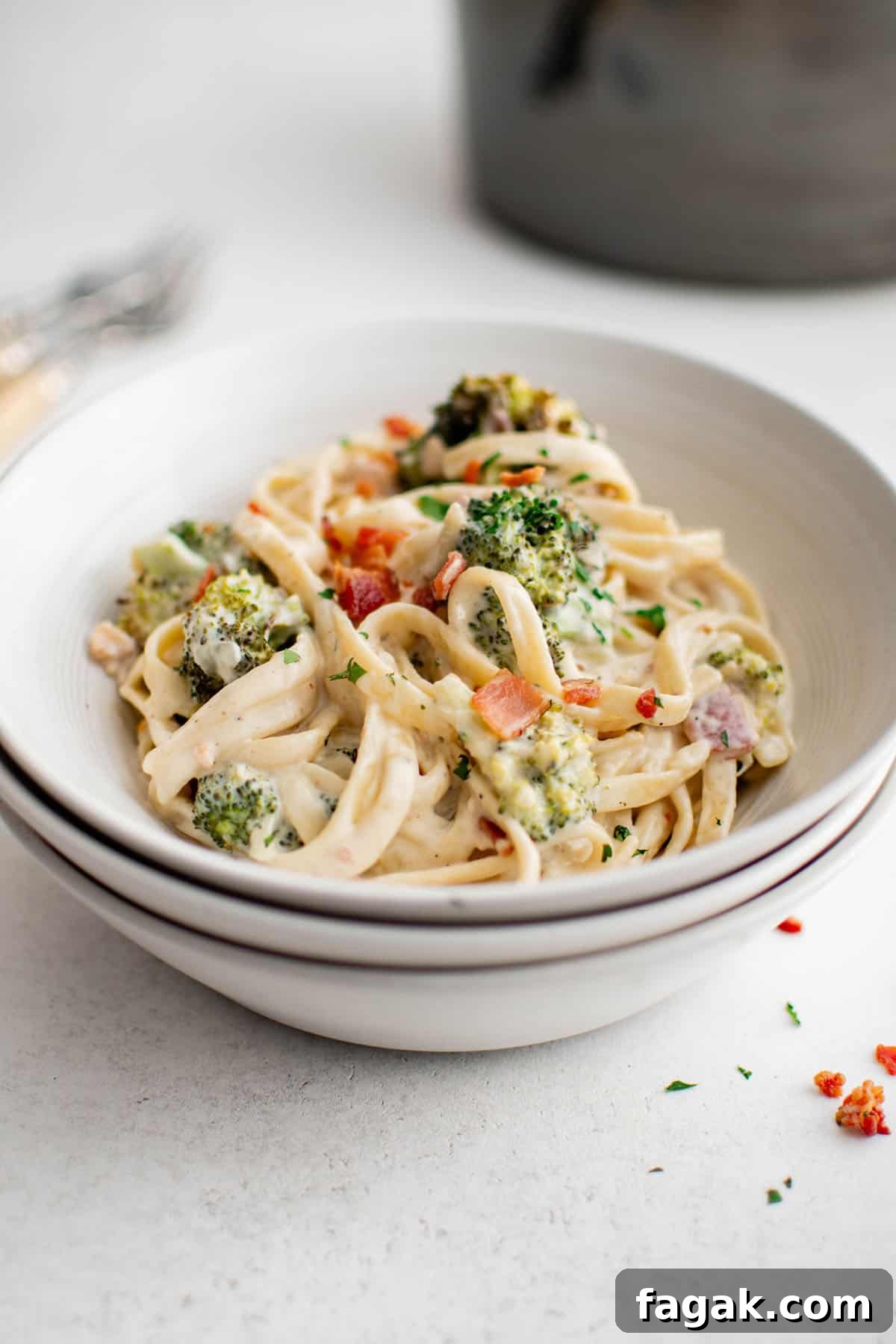 creamy bacon roasted broccoli pasta in a bowl