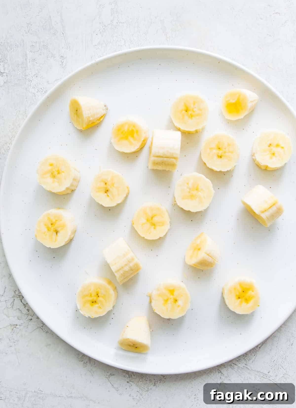 Caramelized Cinnamon Bananas in the Air Fryer 4 A plate with chopped banana on it.