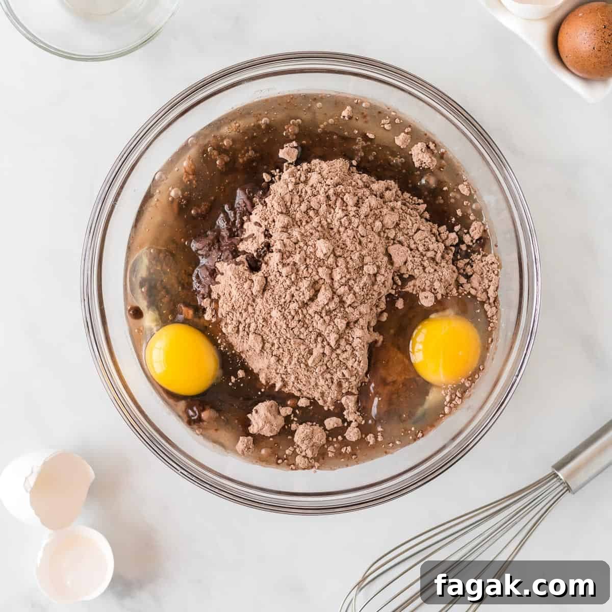 cake mix, oil, and eggs in a bowl