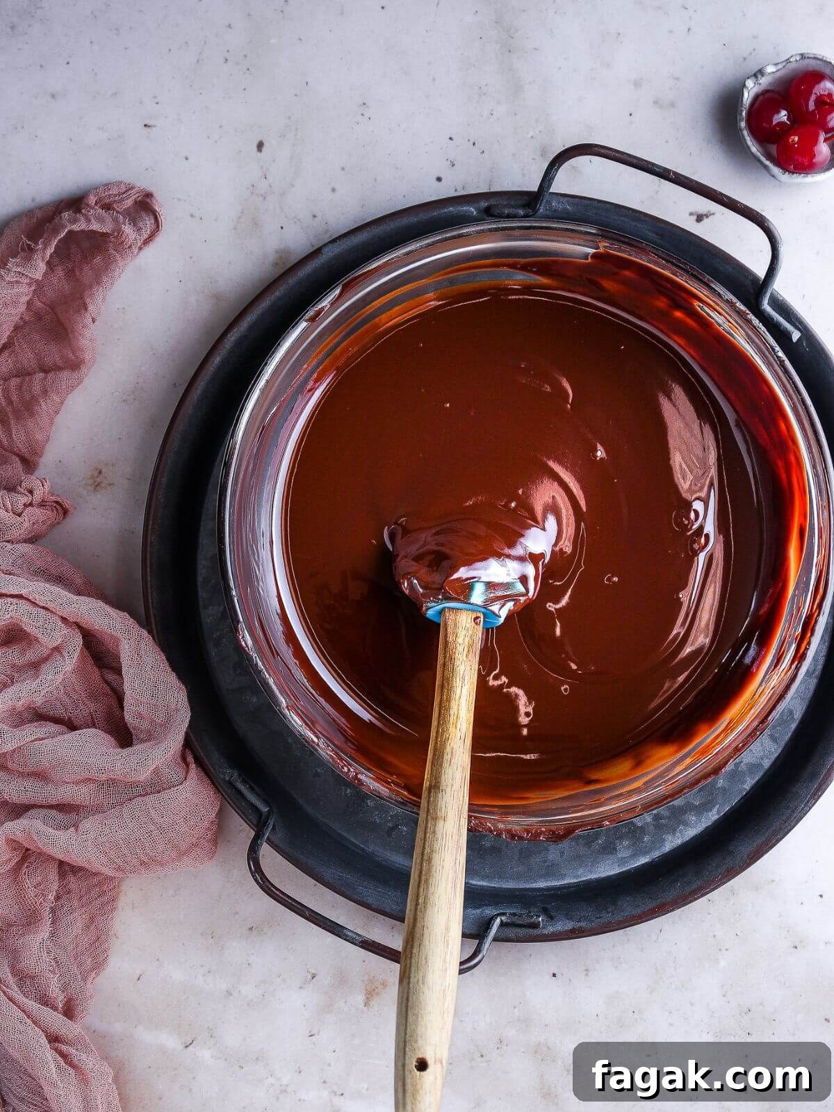 melting chocolate in a heat proof bowl over simmering water.