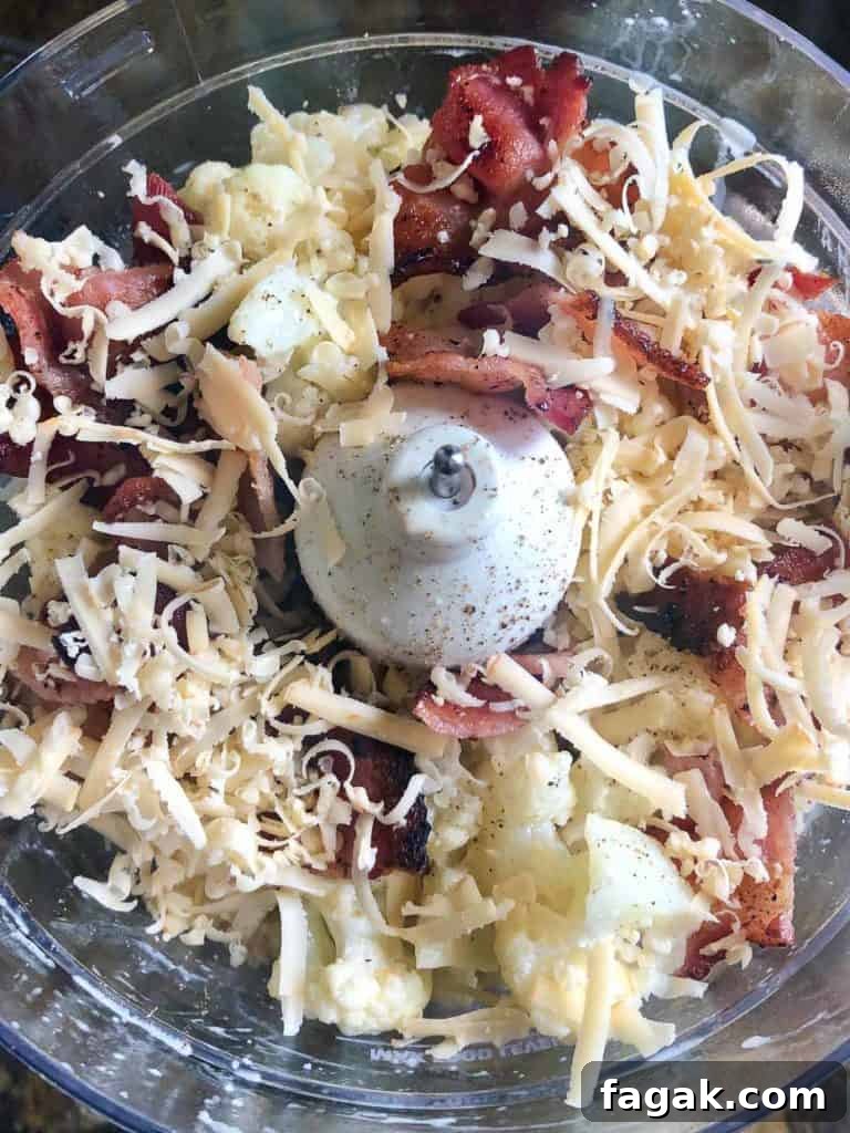Smoked Gouda & Bacon Caauliflower Mash Recipe 5 Cauliflower bacon and gouda in food processor overhead shot