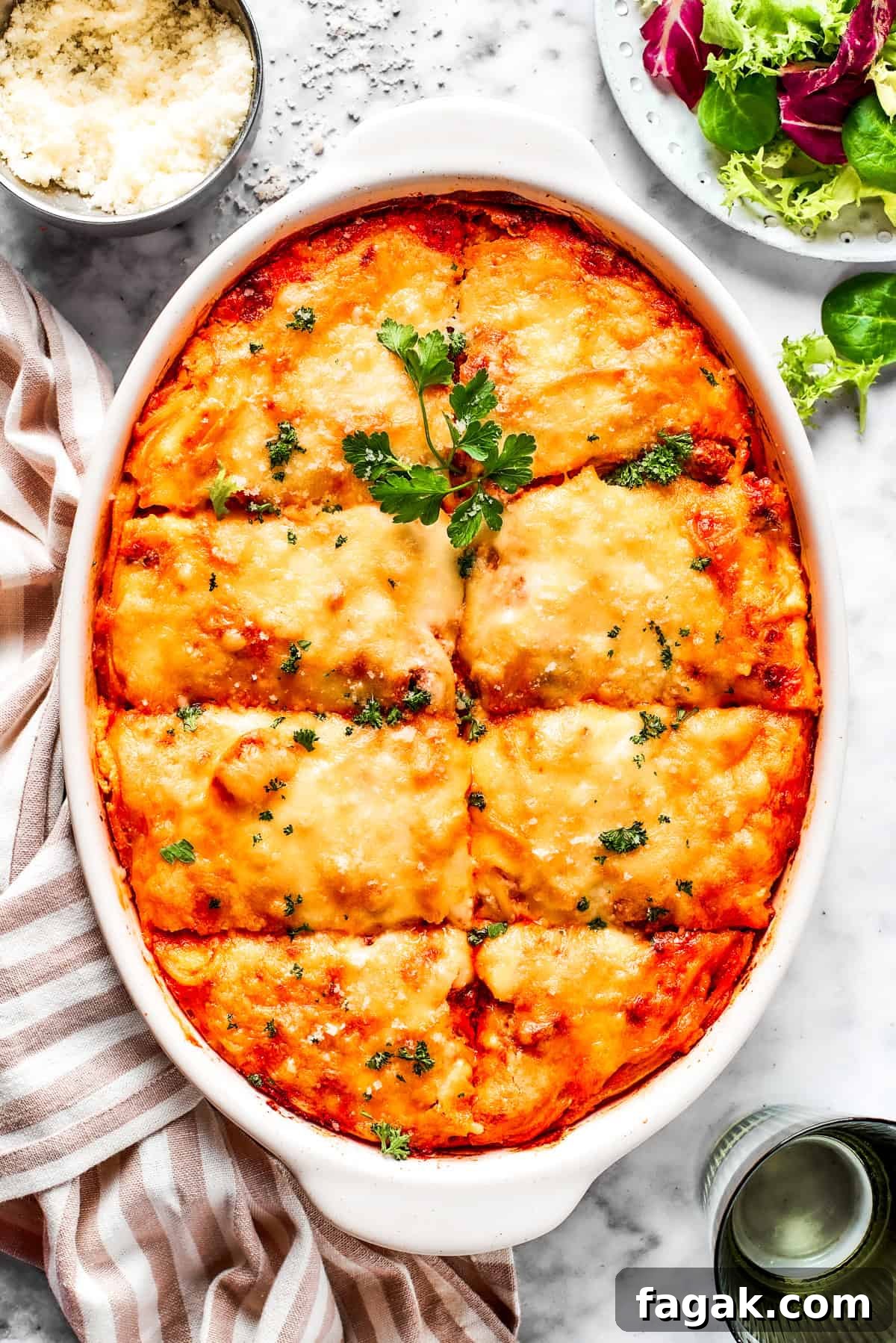 Overhead image of baked million dollar spaghetti in a casserole dish.