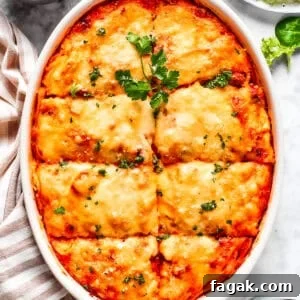 Overhead image of baked million dollar spaghetti in a casserole dish.