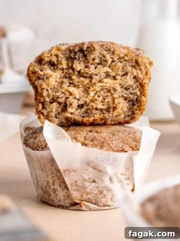 A stack of two cinnamon banana bread muffins.