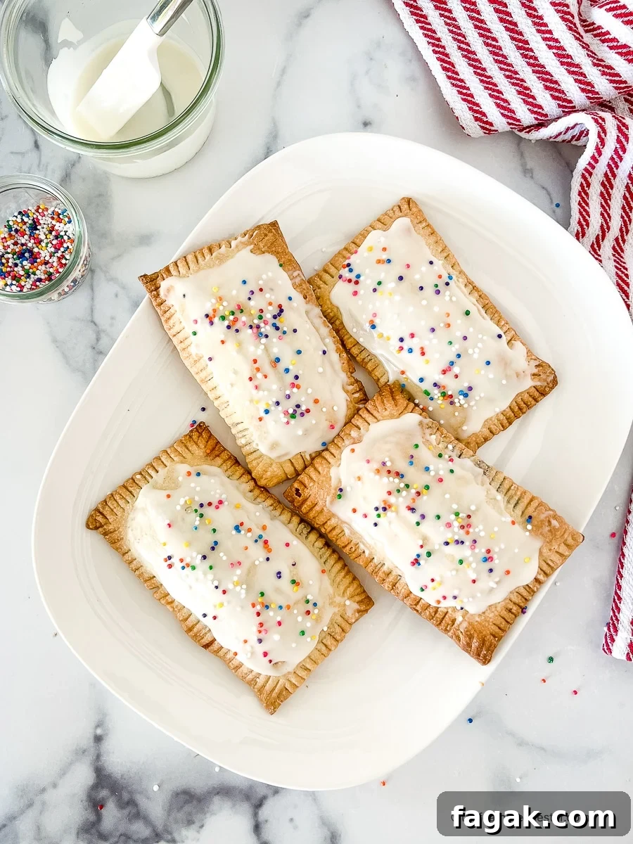 A plate of frosted homemade pop tarts ready to serve.