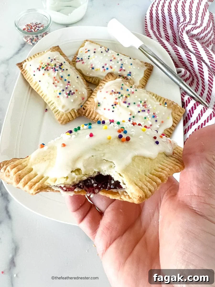 A closeup of breakfast pastries in the hand.