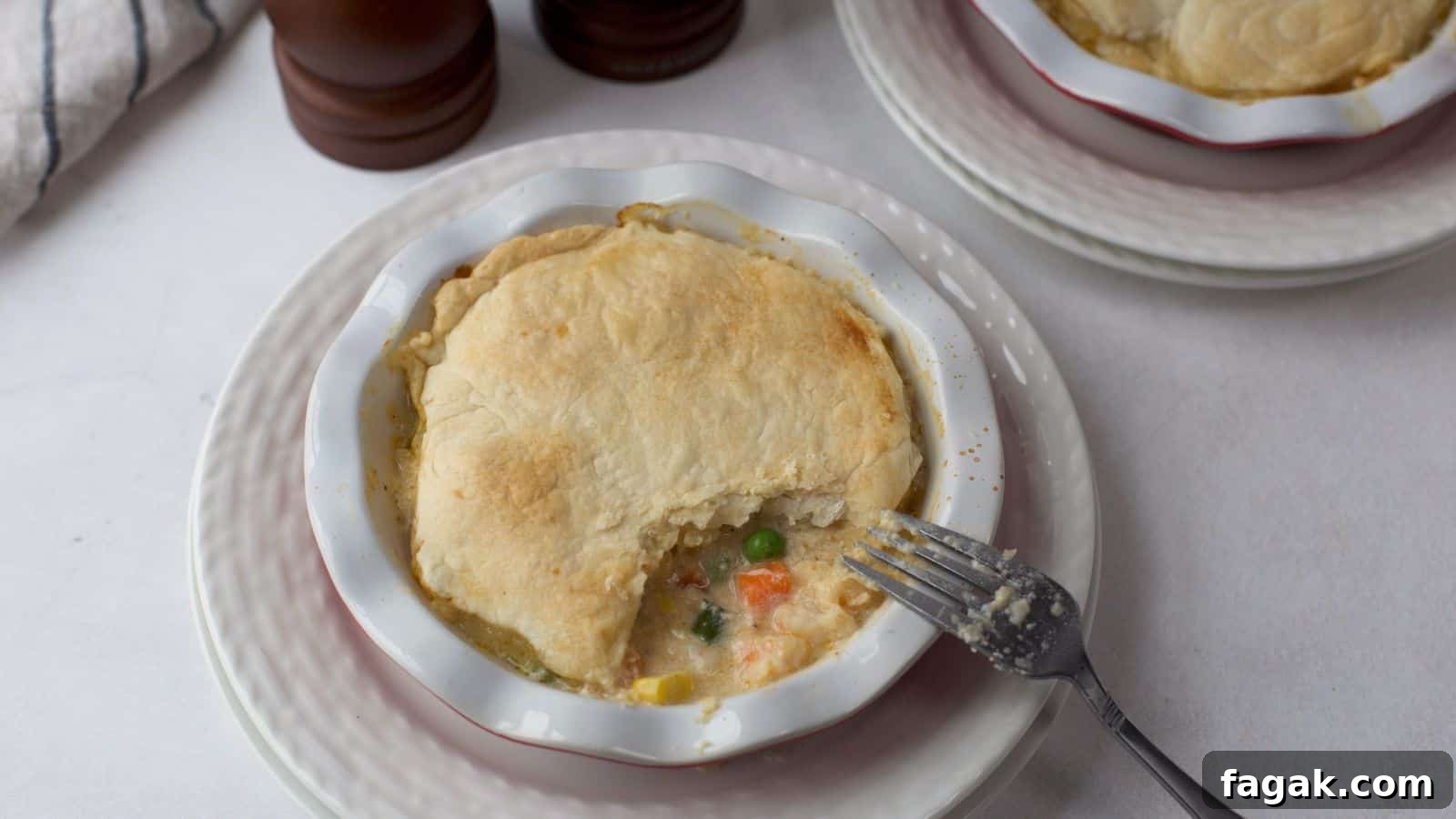 16 Light and Satisfying Shrimp Recipes for Quick Weeknight Meals 16 Seafood Pot Pie in small pie dish.
