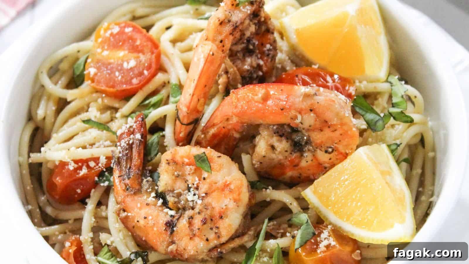 16 Light and Satisfying Shrimp Recipes for Quick Weeknight Meals 6 A bowl of pasta with shrimp and tomatoes.