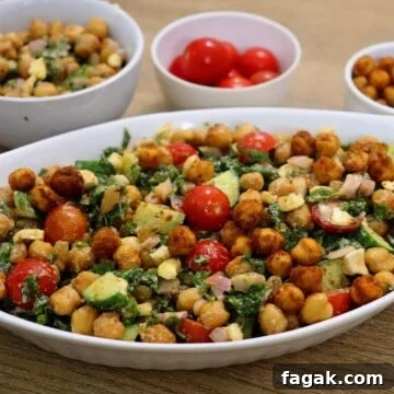 kale chickpea salad with lemon vinaigrette and feta crumbles.