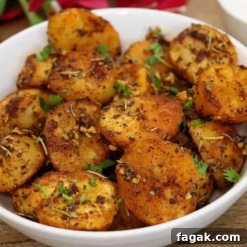roasted mediterranean potatoes in a white colored bowl.