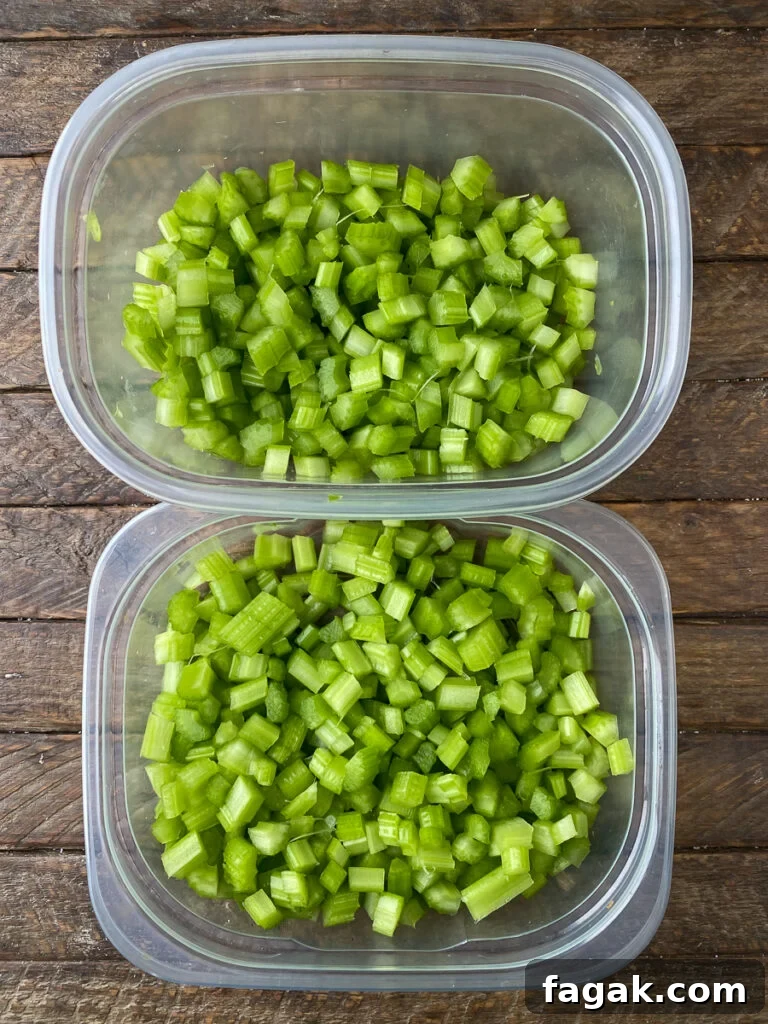 Finely chopped celery in reusable containers to store in fridge
