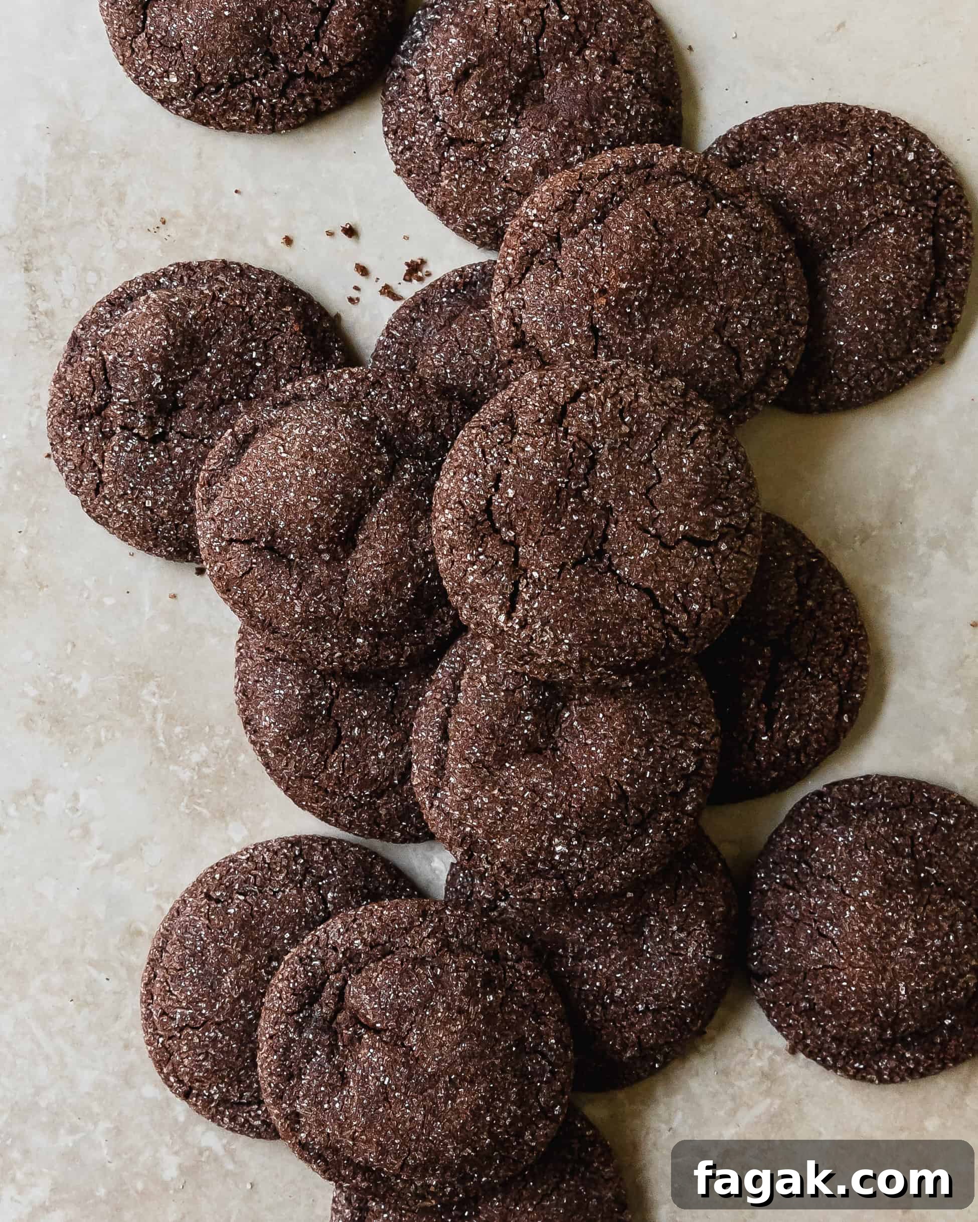 Chocolate sugar cookies are rich and fudgy, deeply chocolatey sugar cookies. These soft and chewy chocolate cookies are quick and easy to make and are the perfect cookie for any holiday gathering. 